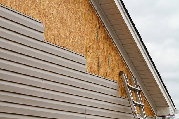 Professional Siding Installation technician working in Fredericktown, PA